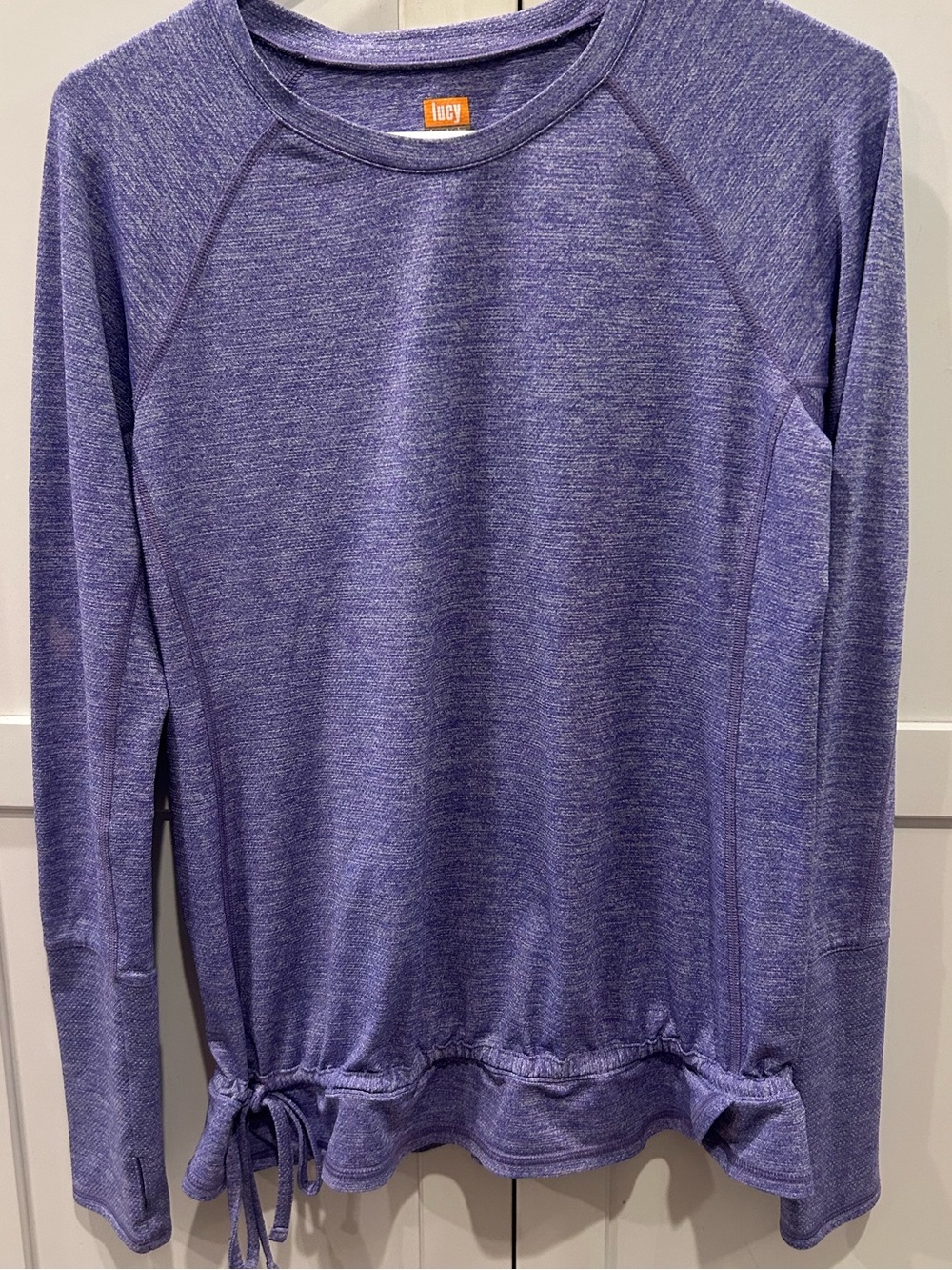 Lucy Tech activewear purple Heathered long sleeve top with side tie ruffle